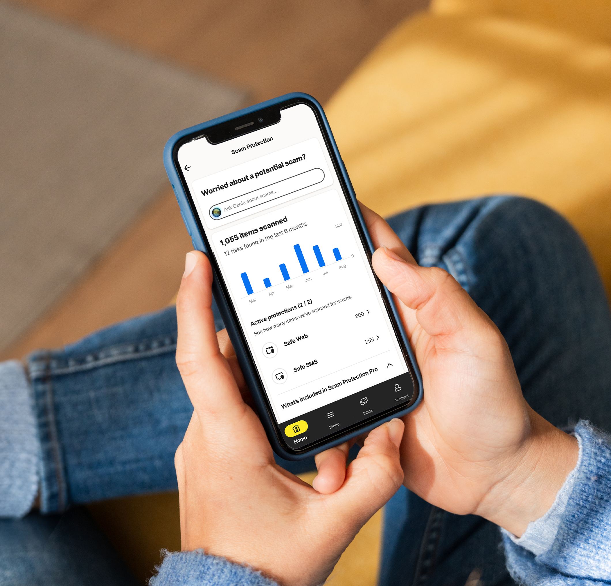 person looking at LifeLock app on phone